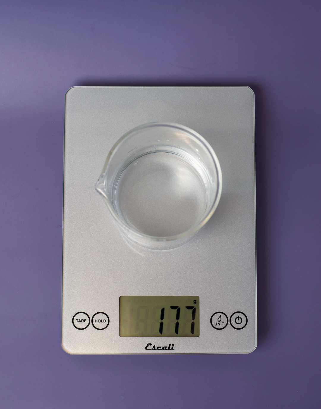 Weight of water on a scale.